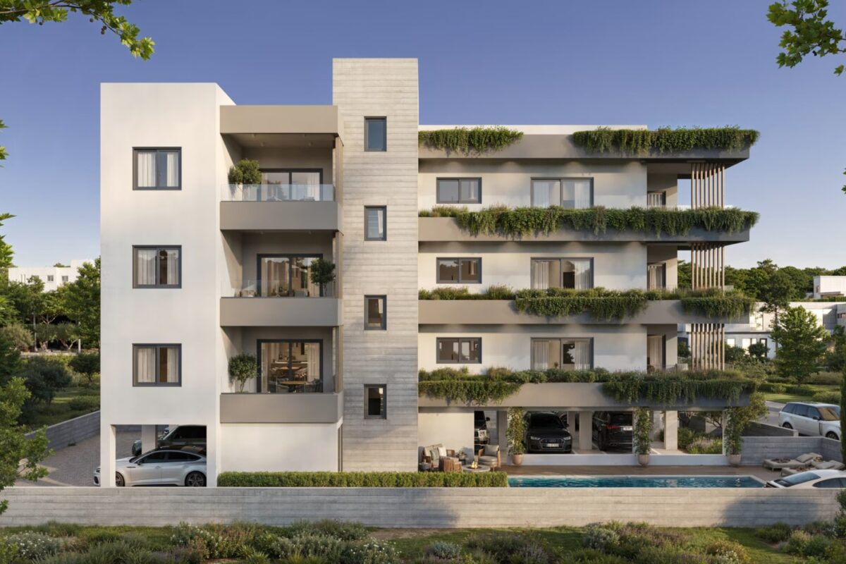 Render of modern apartment building with communal pool in Universal Paphos