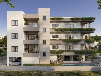 Render of modern apartment building with communal pool in Universal Paphos