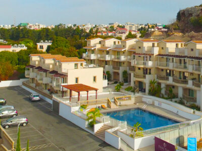 Aerial view of the residential development and communal pool in Universal Paphos
