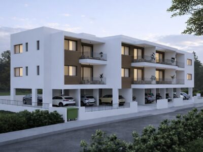 Render of a modern apartment building with covered parking in Geroskipou, Paphos